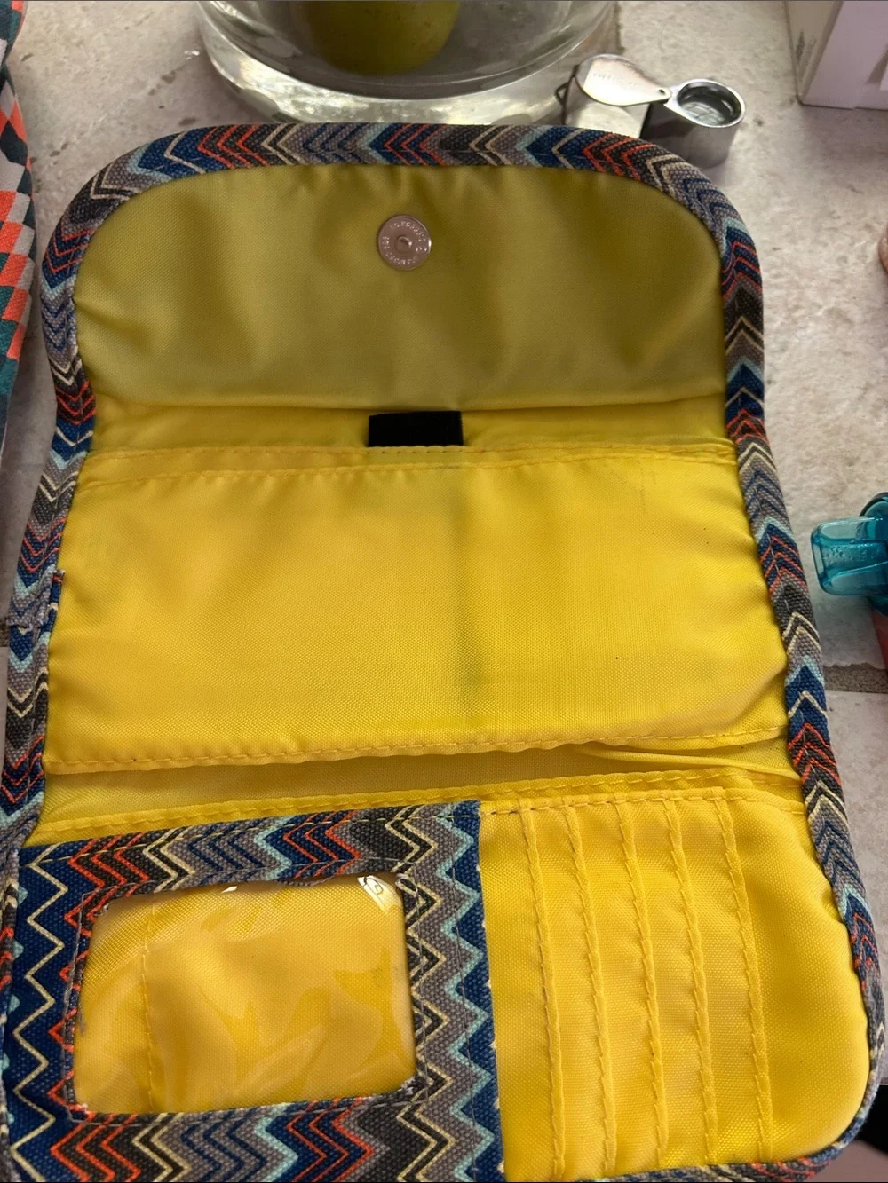 Kavu Chevron Sling Backpack in Coral, Teal & White With Wallet